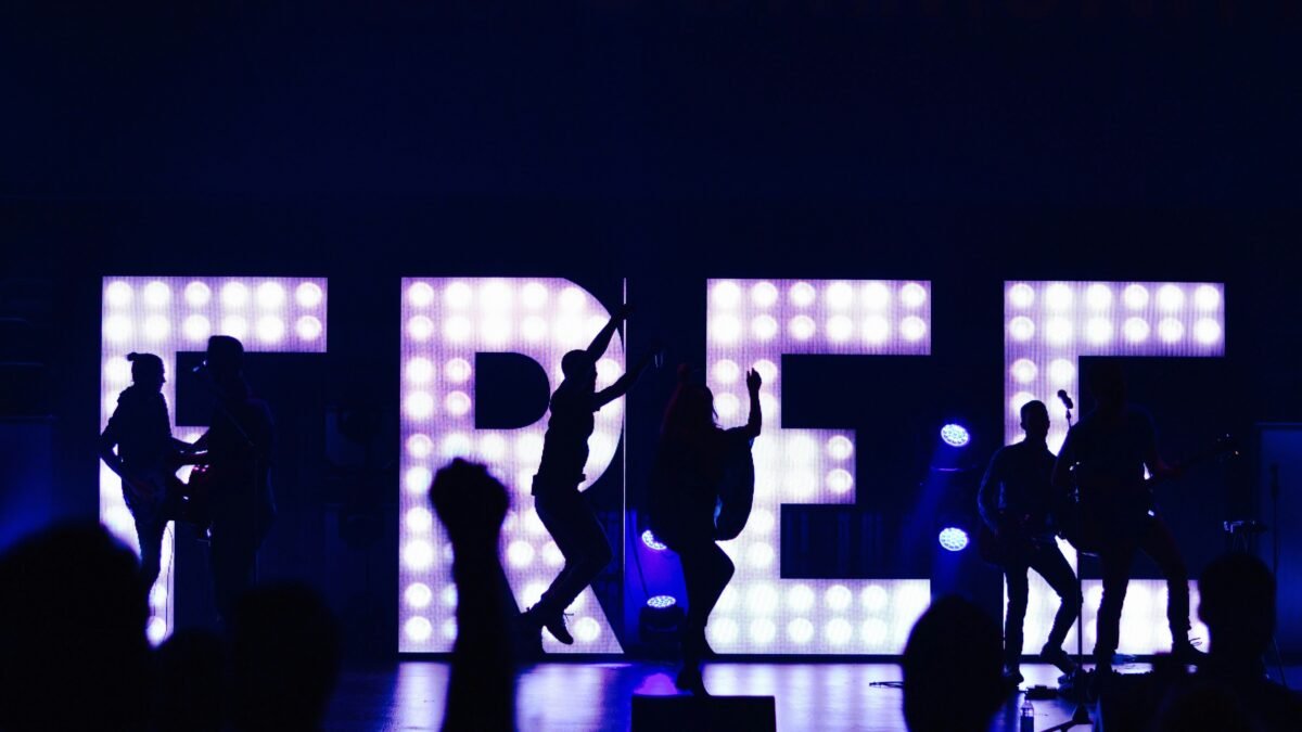 silhouette of people with free marquee letters